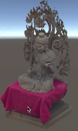 ピンクの布の上に置かれた不動明王3Dスキャン像